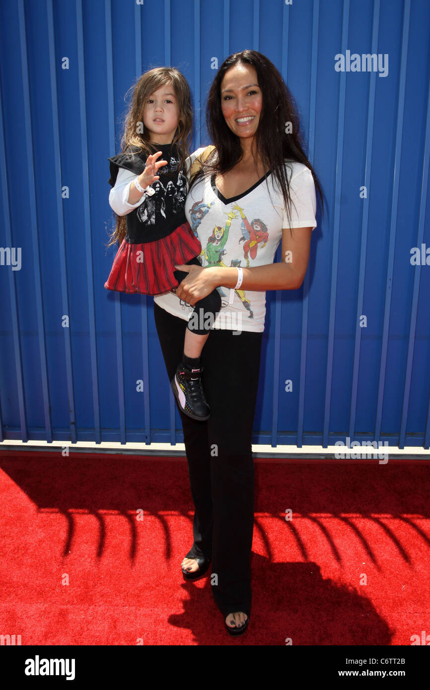 Tia Carrere and daughter Bianca The SK8 4 Life event benefiting the Rob Dyrdek Foundation held at The Fantasy Factory Los Stock Photo