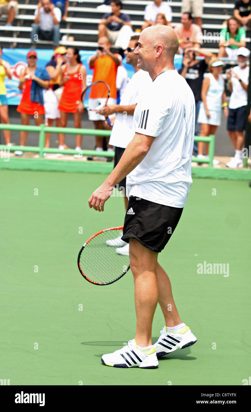 Andre Agassi Tennis pros Andre Agassi and Pete Sampras open a free Tennis Clinic to encourage young children to get into the Stock Photo