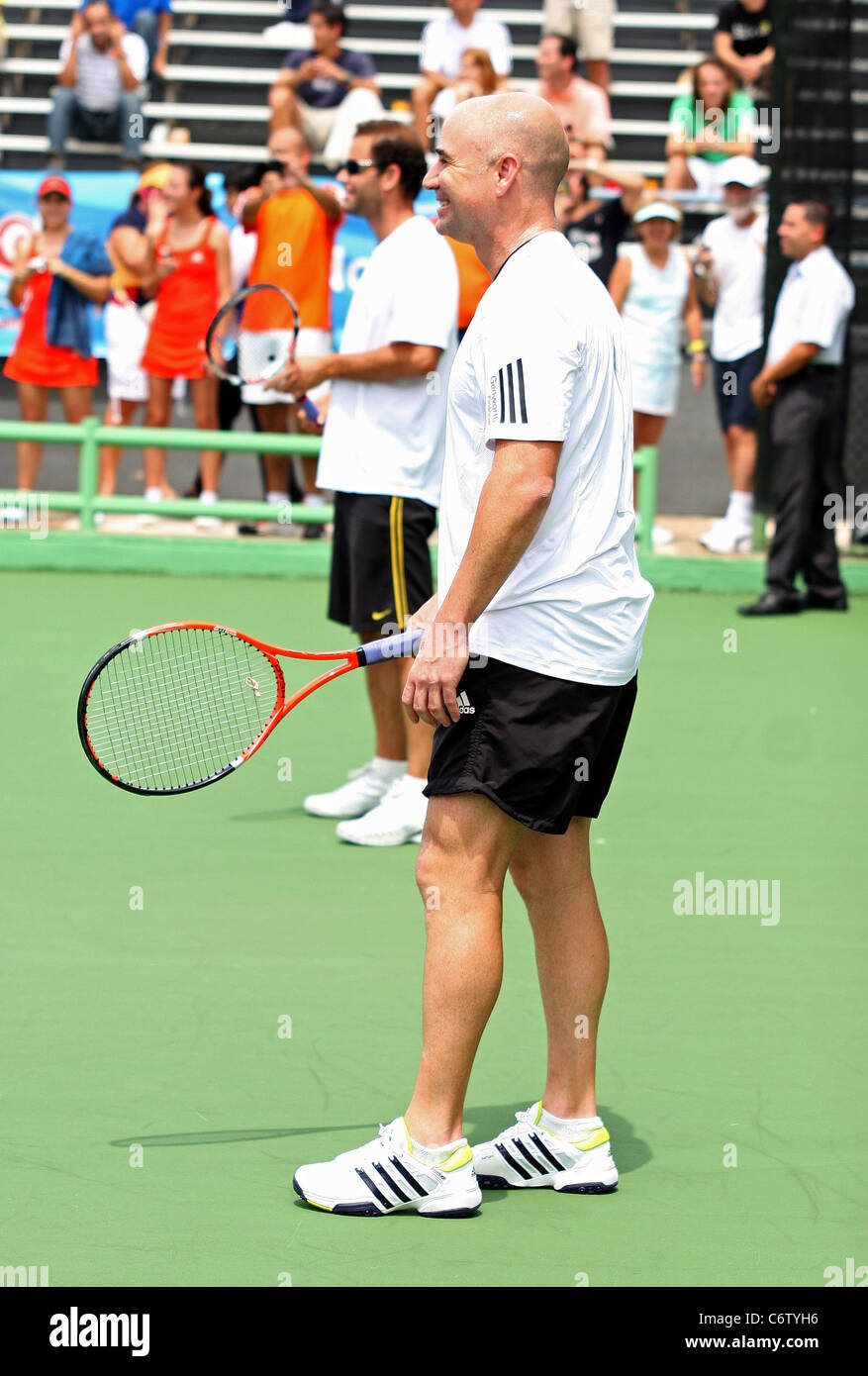 Pete Sampras Tennis pros Andre Agassi and Pete Sampras open a free Tennis Clinic to encourage young children to get into the Stock Photo