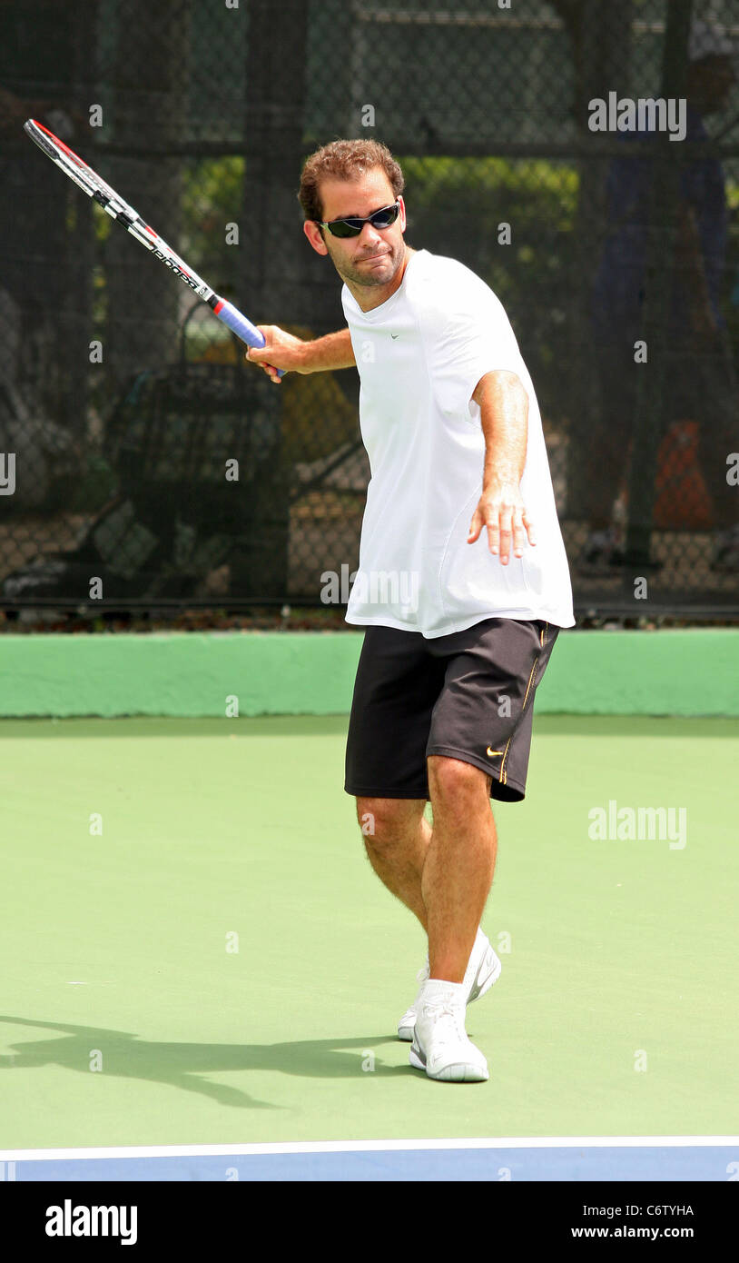 Pete Sampras Tennis pros Andre Agassi and Pete Sampras open a free Tennis Clinic to encourage young children to get into the Stock Photo