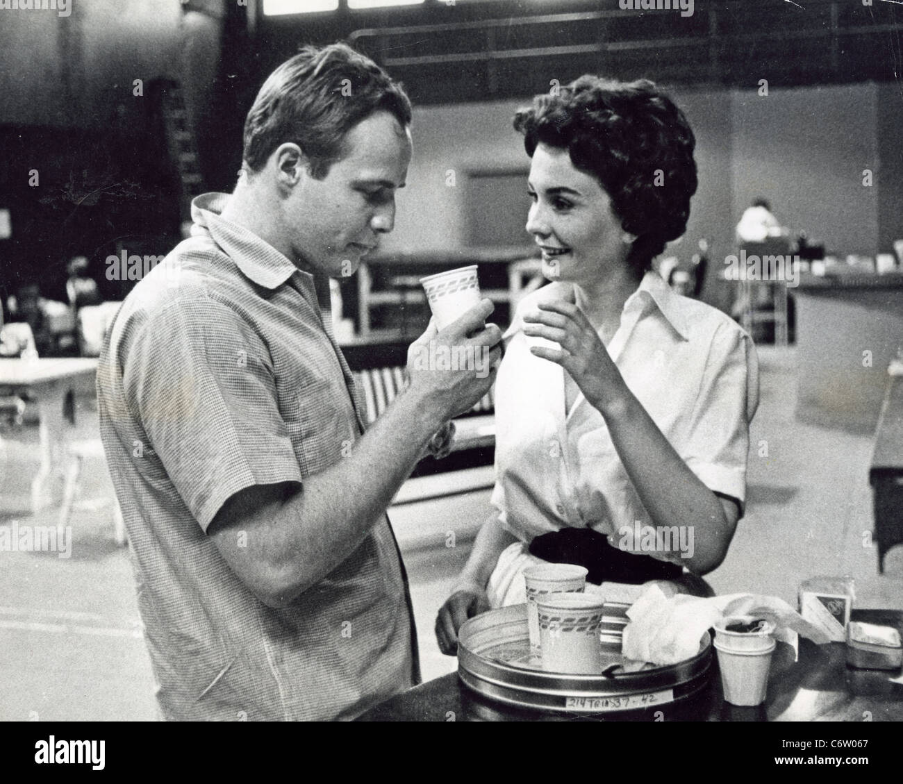 GUYS AND DOLLS Marlon Brando and Jean Simmons during a break in filming