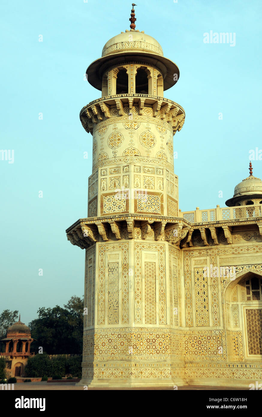 Highly ornate white marble tower at the  Tomb of Itimad ud Daulah whose name was Mirza Ghiyas Beg and his wife Asmat Begum. Agra Stock Photo