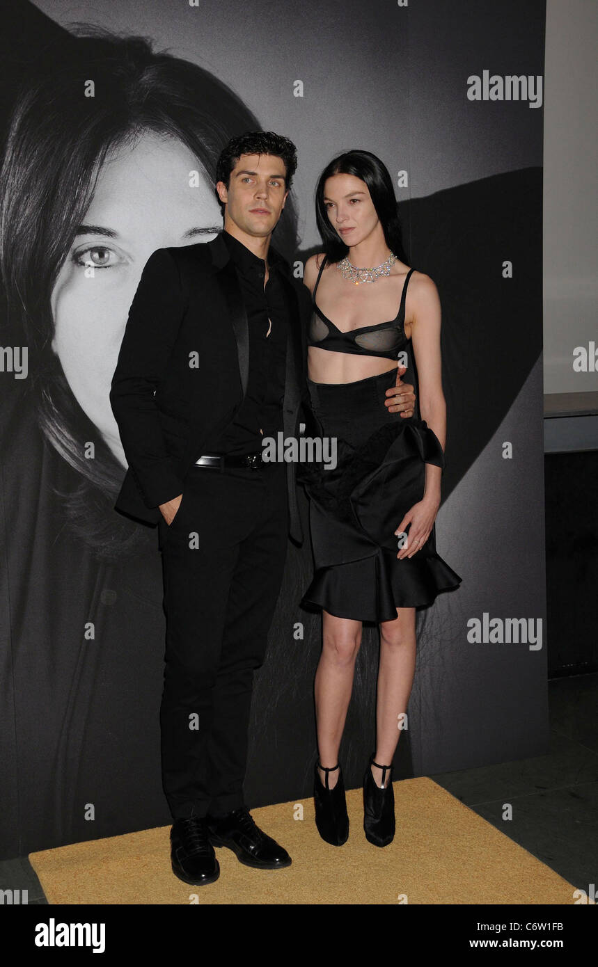 Roberto Bolle and Mariacarla Boscono Givenchy celebrates the closing of  Marina Abramovic's 'The Artist is Present' at The Stock Photo - Alamy