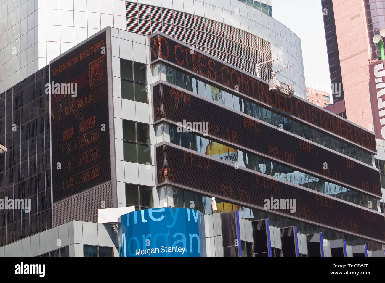Stock quotes are pictured on a Thomson Reuters Screen on Times Square