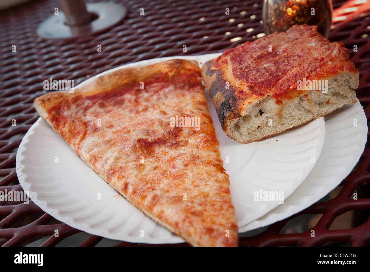 New York Regular Slice and a Napolitan Square pizza at Spumoni Garderns in the New York city borough of Brooklyn Stock Photo