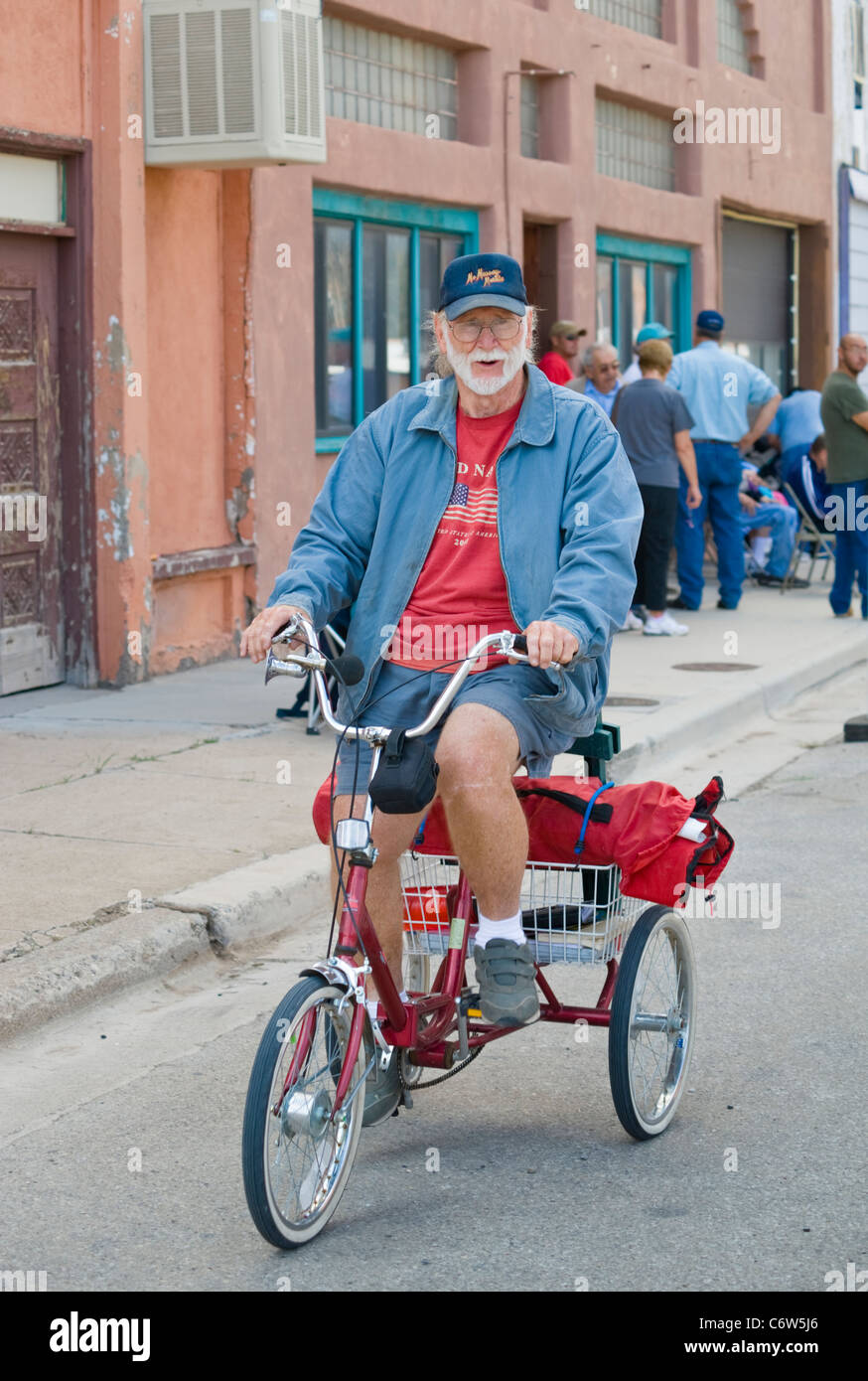 Riding tricycle senior hi res stock photography and images Alamy