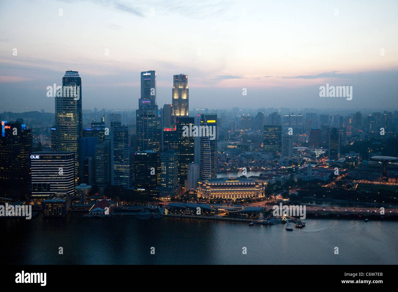 Singapore Skyline over the marina and Financial District at dusk Stock Photo