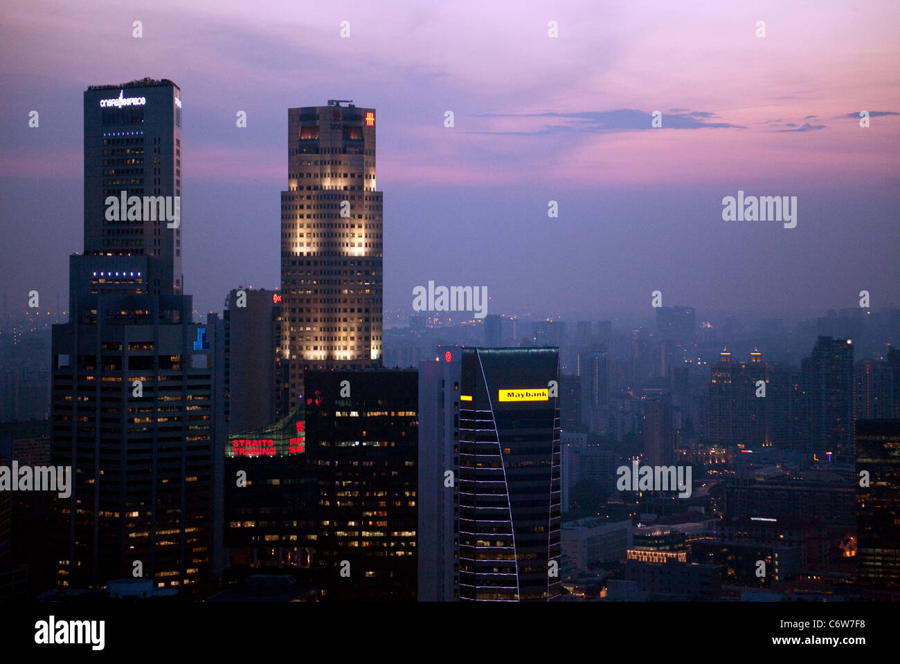 Singapore Skyline over the marina and Financial District at dusk Stock Photo