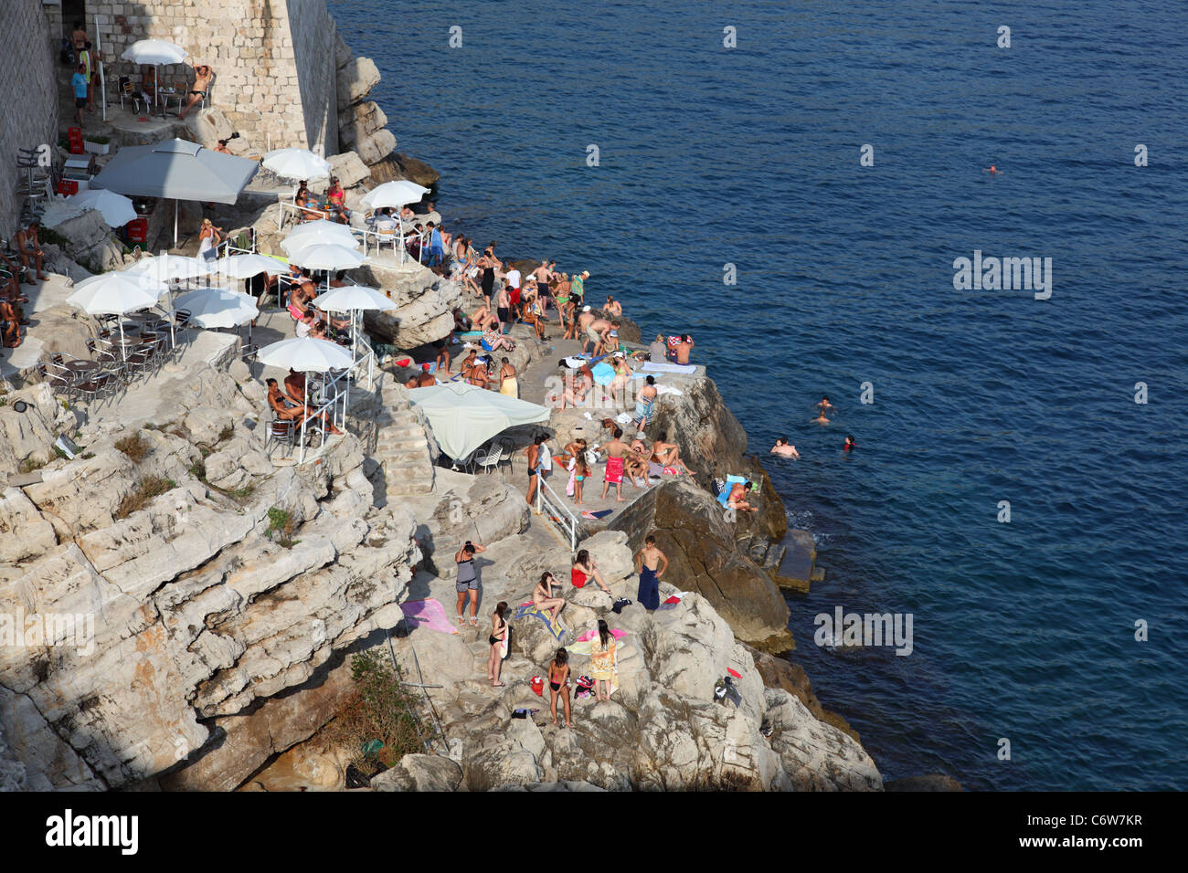 People at the Adriatic Coast of Dubrovnik, Croatia Stock Photo