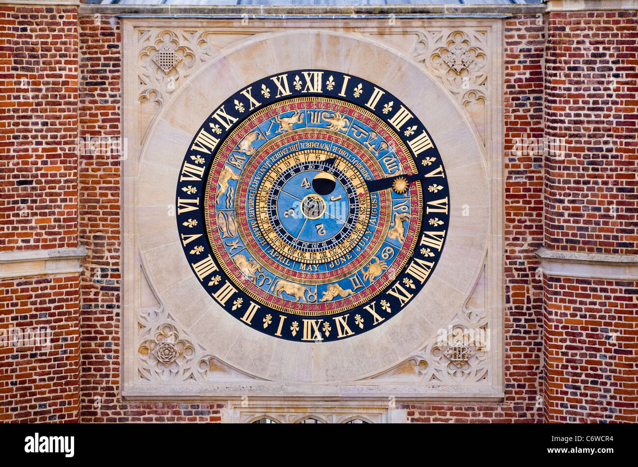 King Henry VIII’s astronomical clock / face which overlooks the Royal Courtyard at Hampton Court Palace. Middlesex. UK. Stock Photo