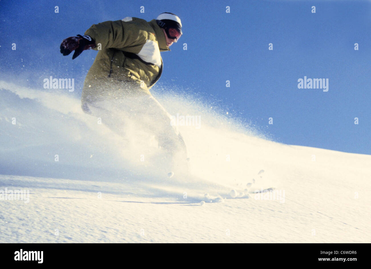 Snowboarding in the powder, les menuires, three valleys, france. Stock Photo