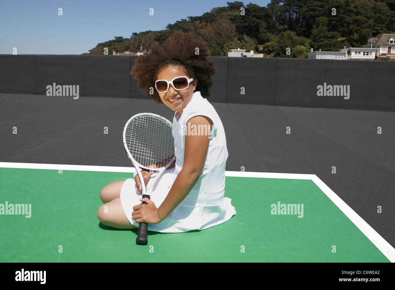 Mixed race young girl tennis hi-res stock photography and images - Alamy