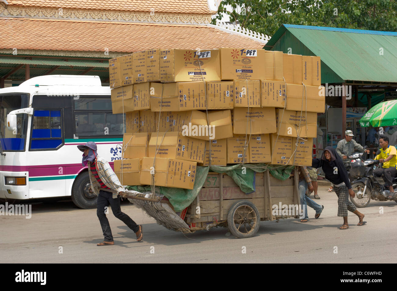 Hand cart loaded with boxes, at Poi Pet on the Thai-Cambodian border, Cambodia Stock Photo