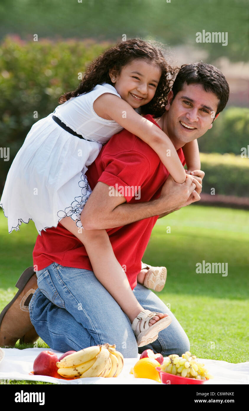 Portrait of father and daughter at a picnic Stock Photo