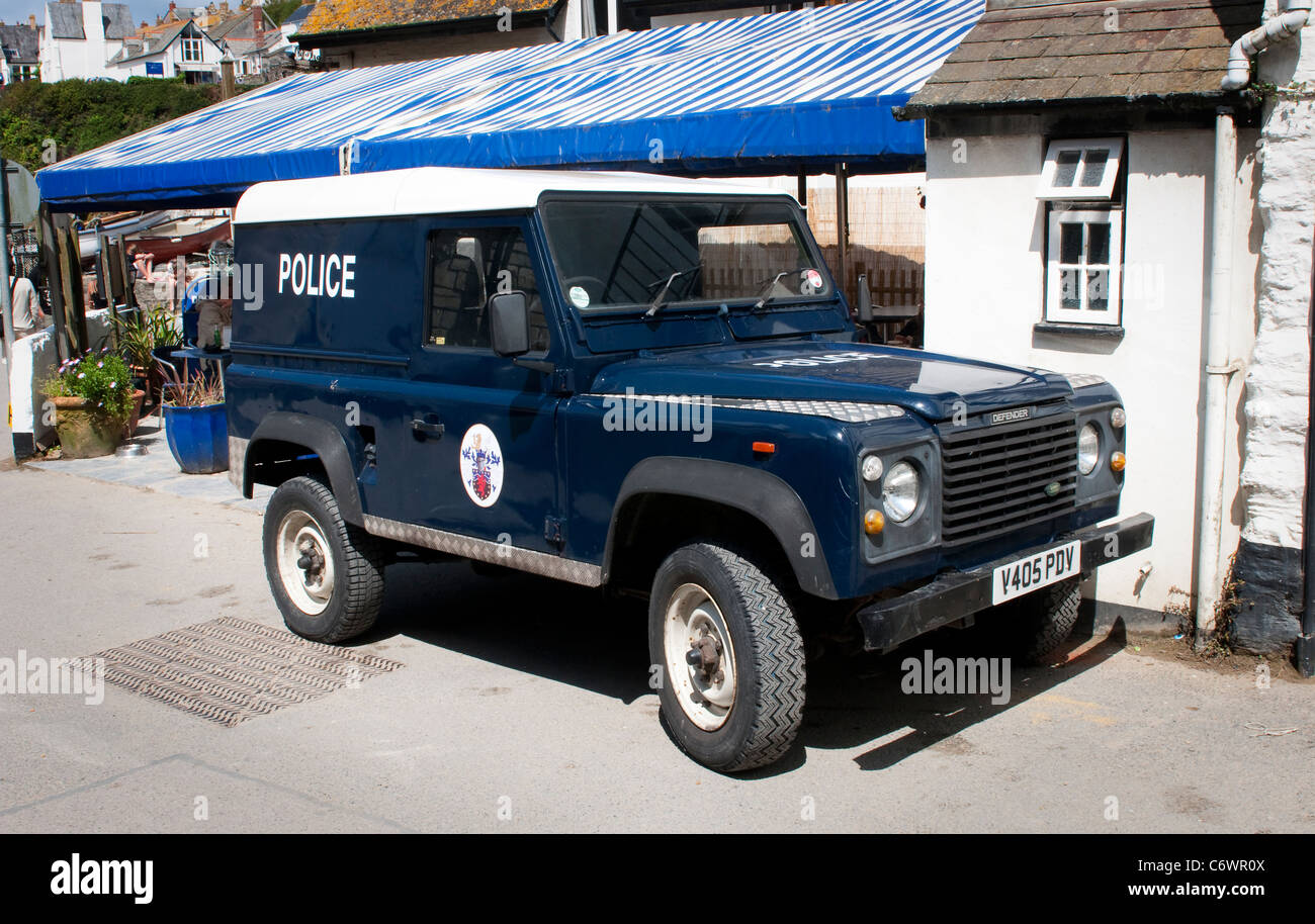 Blue Police Land Rover Defender parked on a street in Port Isaac, Cornwall,  England Stock Photo - Alamy