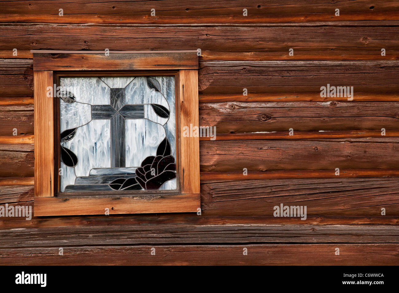 Log Chapel Stained Glass Window Stock Photo