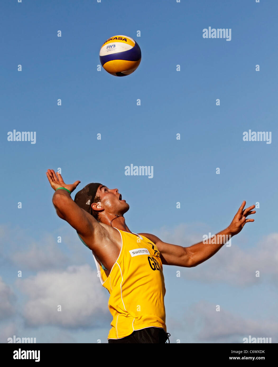 Germany's Henry Glöckner serves at the FIVB Beach Volleyball Swatch Junior  World Championships on Sept. 2, 2011 in Halifax, Can Stock Photo - Alamy