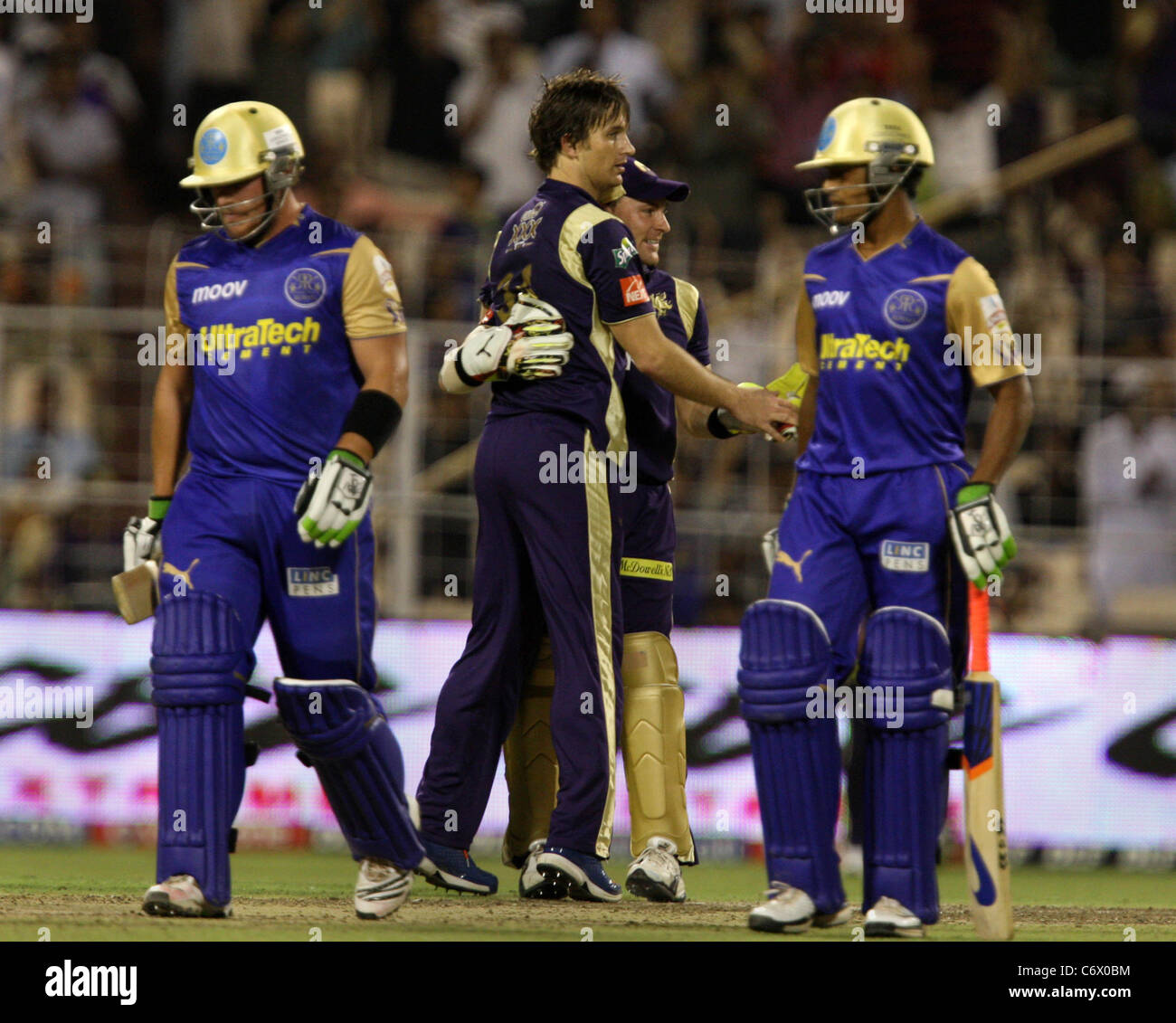 Shane Bond celebrates with Brendon McCullum after taking Aaron Finch wicket The Kolkata Knight Riders vs Rajasthan Royals, Stock Photo