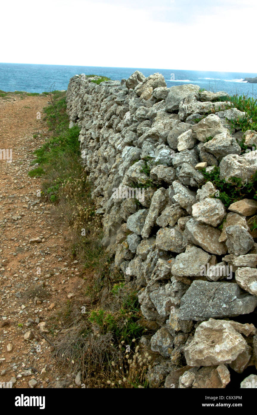 A dry stone wall, typical to the Balearic island of Menorca. Stock Photo