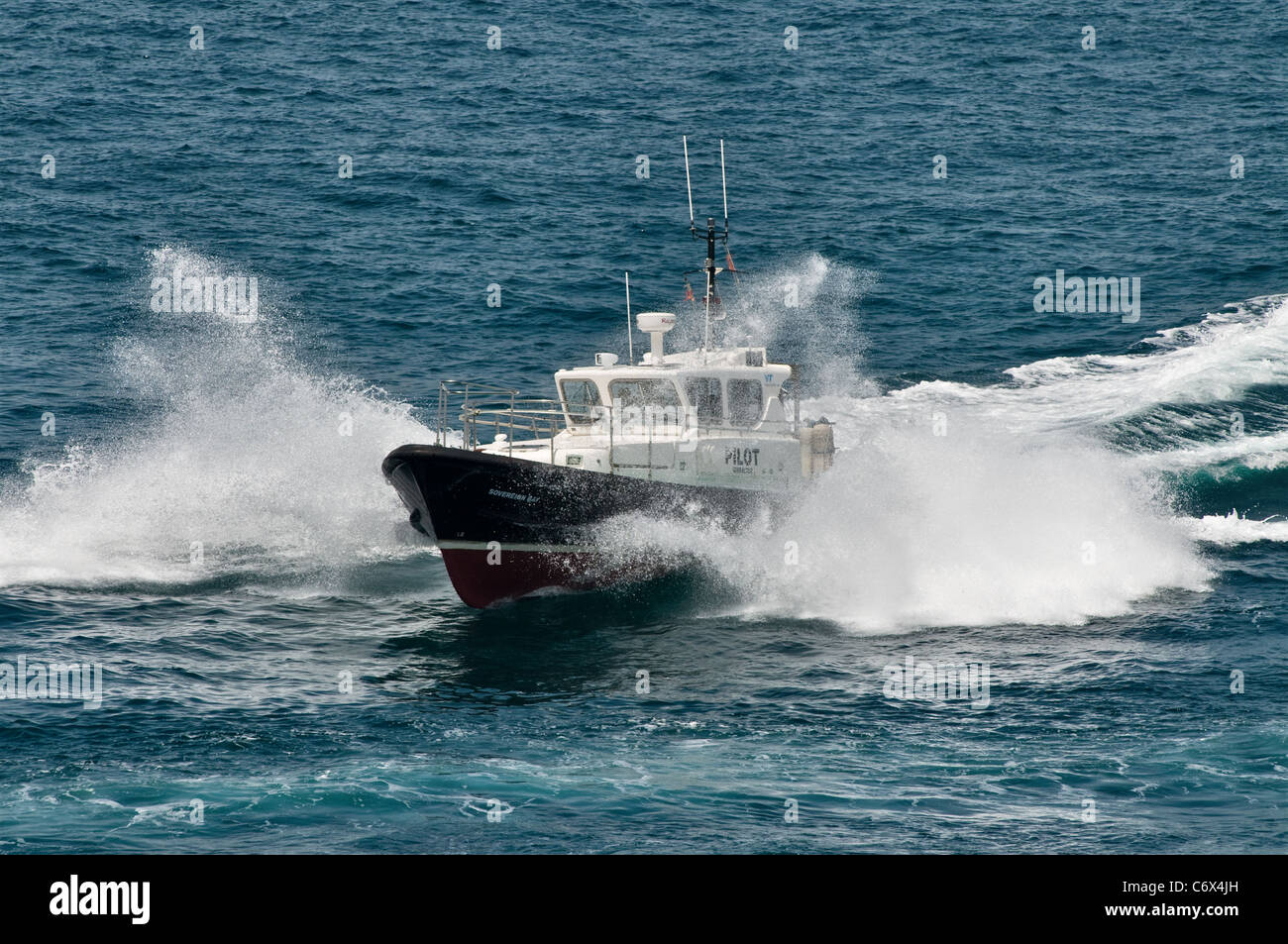 Pilot launch 'Sovereign Bay'. Sea spray bow wave. Gibraltar, Mediterranean, Europe Stock Photo