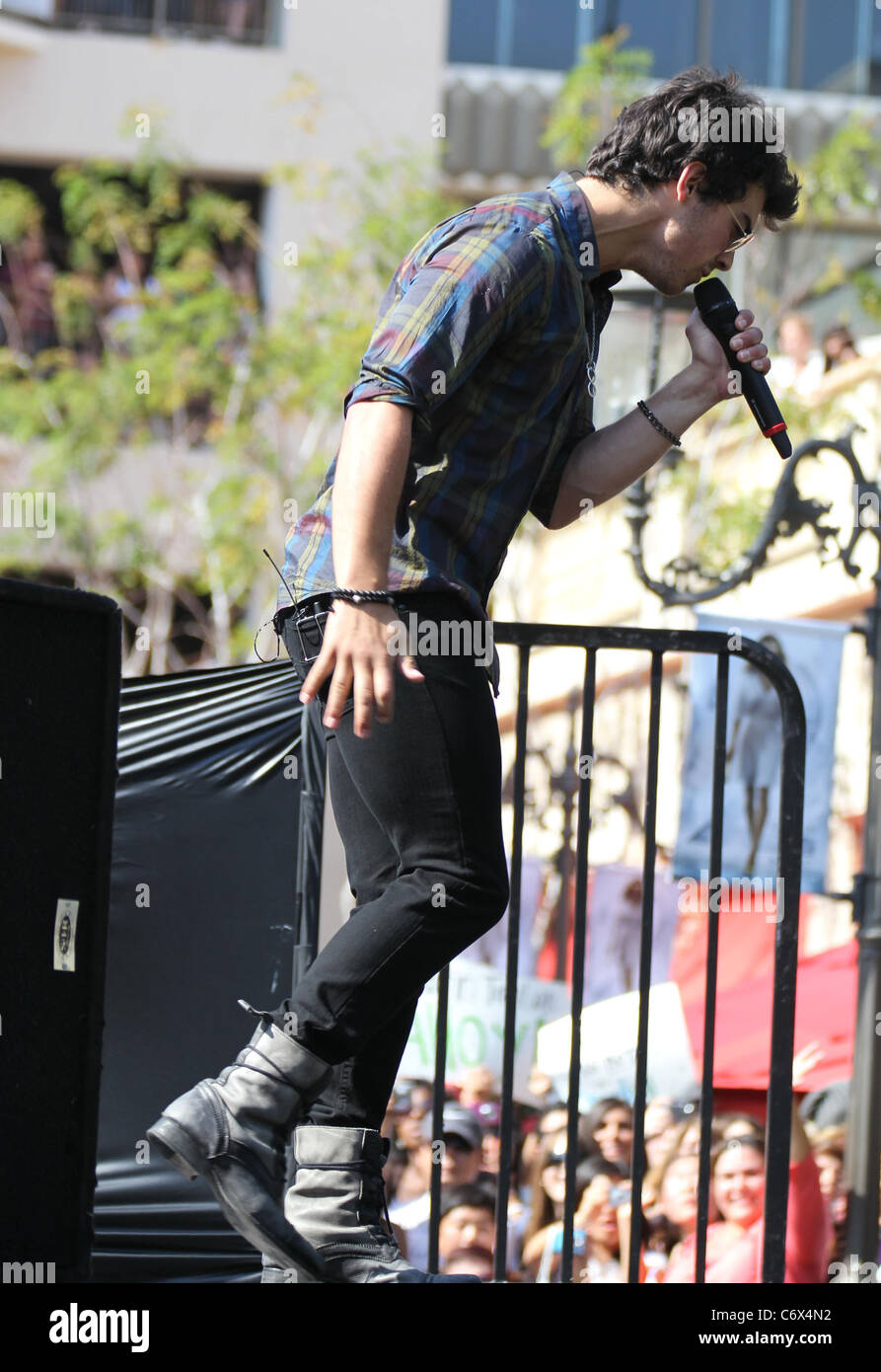 Nick Jonas Jonas Brothers performing live on stage at The Grove Los ...