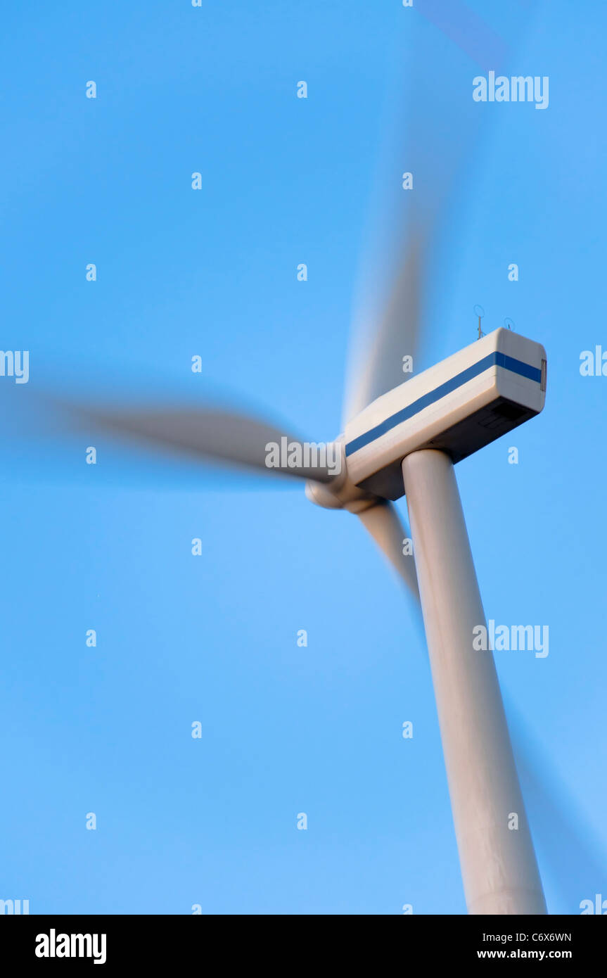 An image of wind turbine against blue sky Stock Photo - Alamy