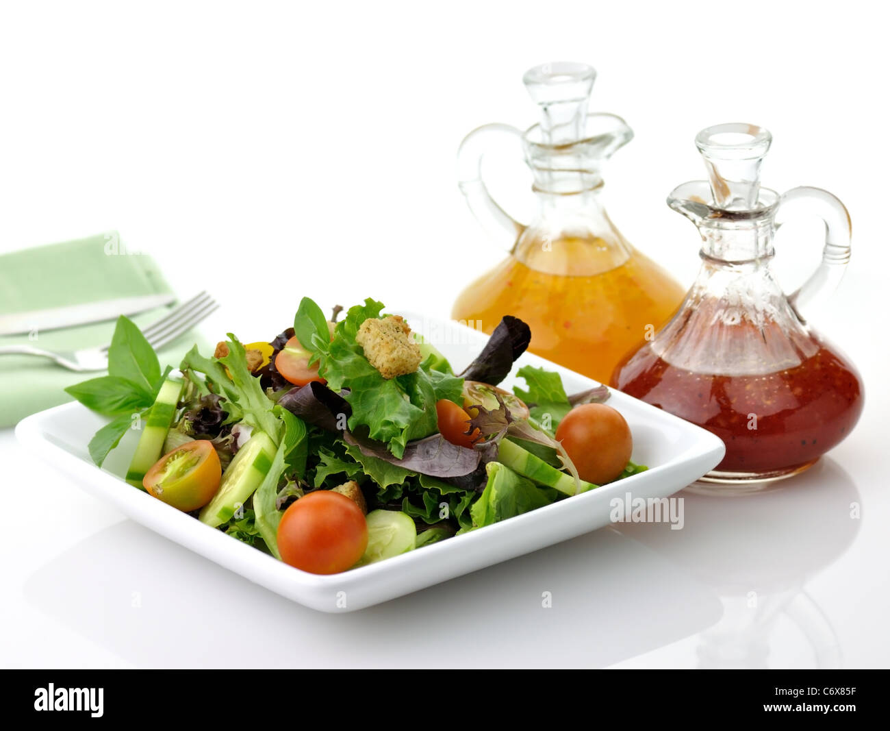 Healthy vegetarian Salad with salad dressings Stock Photo
