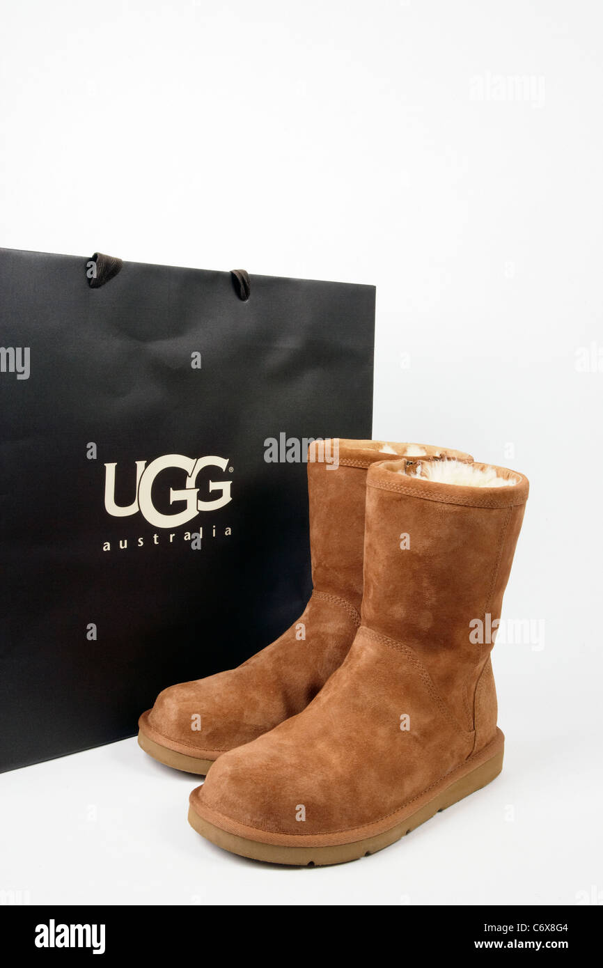 Ugg boots with original shopping bag Stock Photo - Alamy