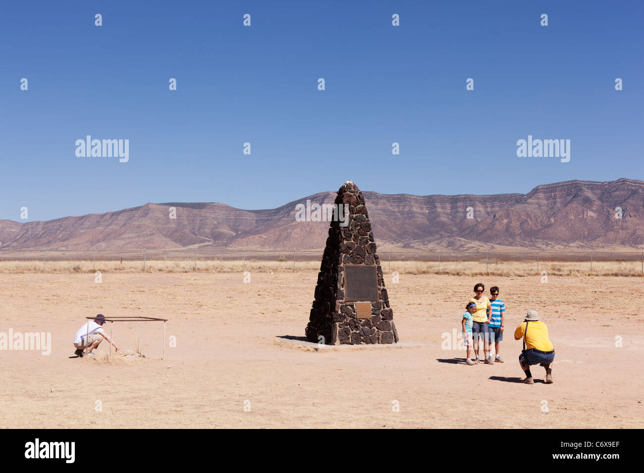 Sightseers at Trinity Site, a remote area of New Mexico where the world's first nuclear device was exploded in 1945. Stock Photo