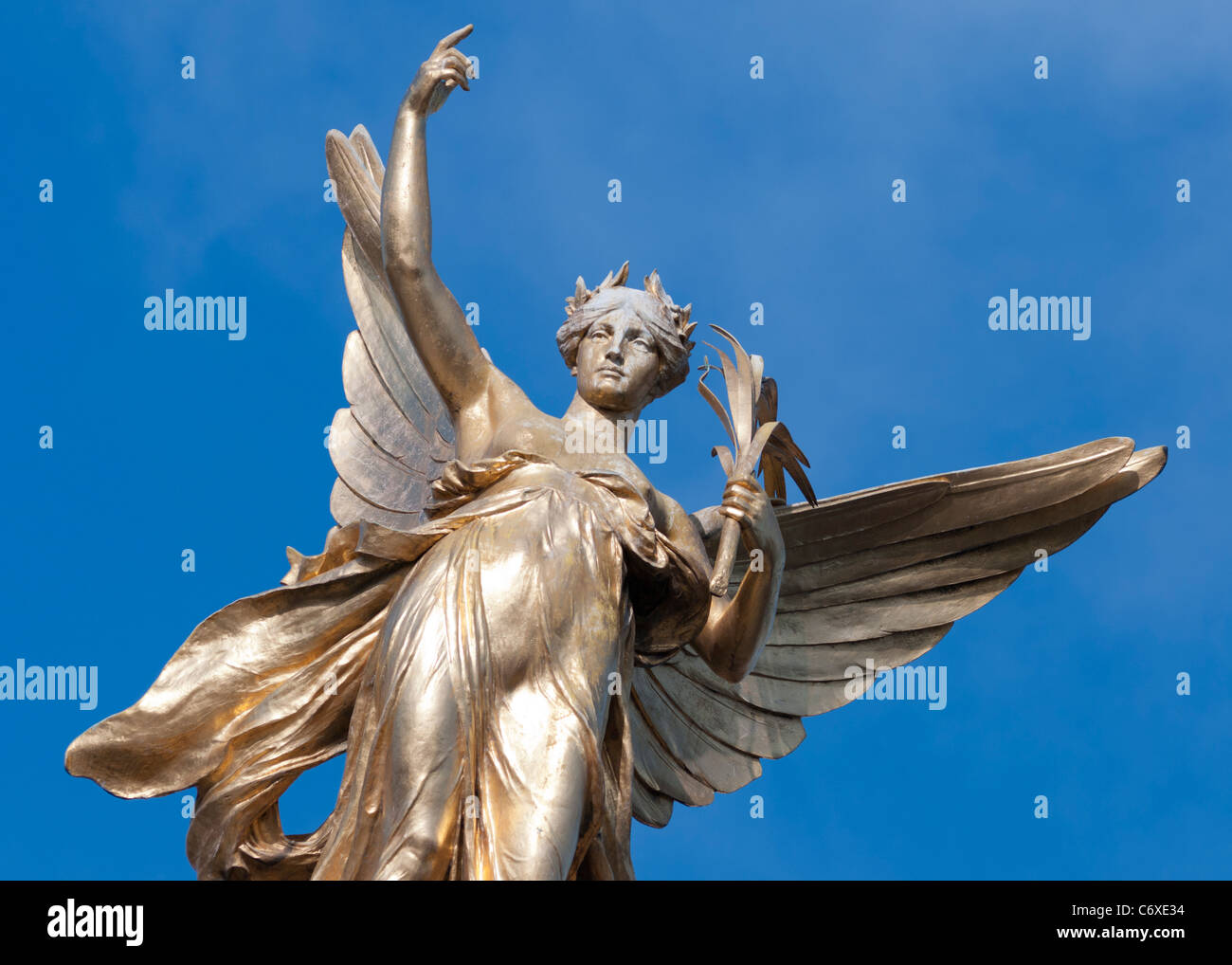 Closeup of gold angel statue on Victoria Memorial Fountain outside