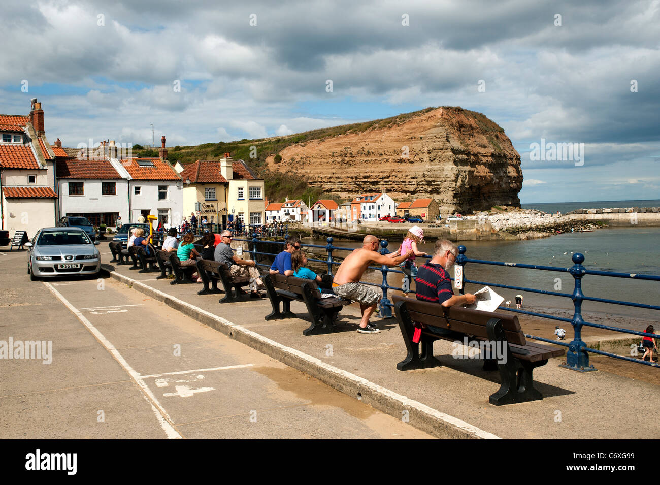 People enjoying nice weather at Staithes, North East, UK. Aug 2011 Stock Photo