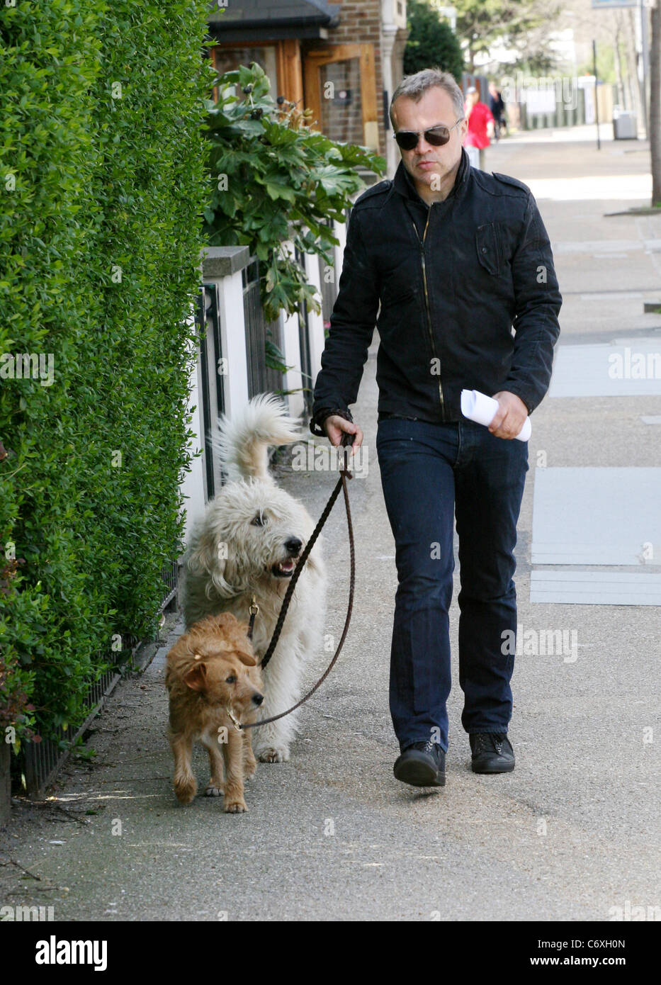 Graham Norton seen walking his dogs home London, England 21.04.10