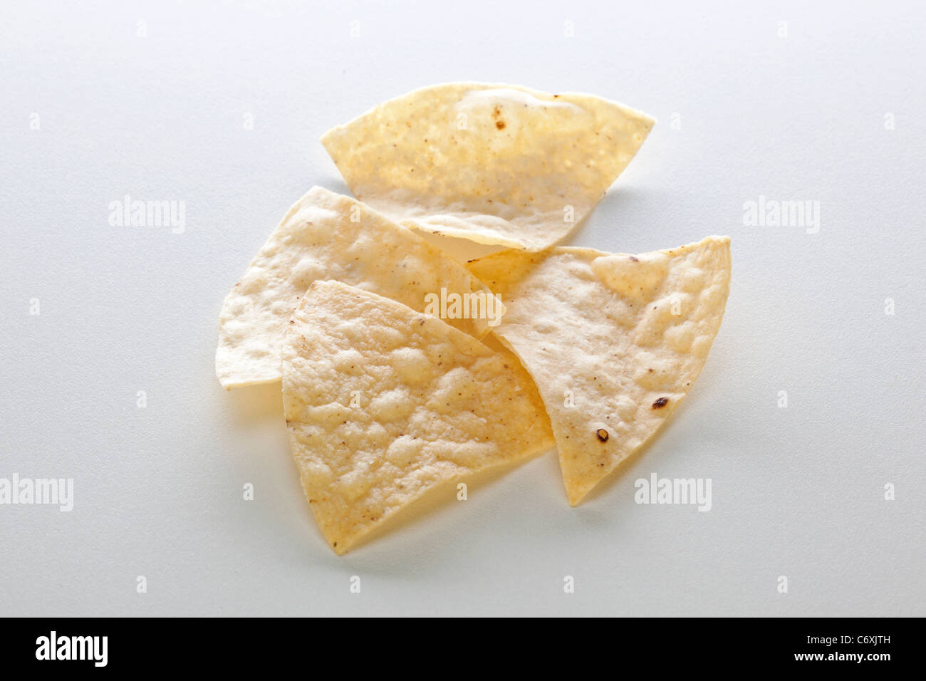 group of tortilla chips on white Stock Photo Alamy