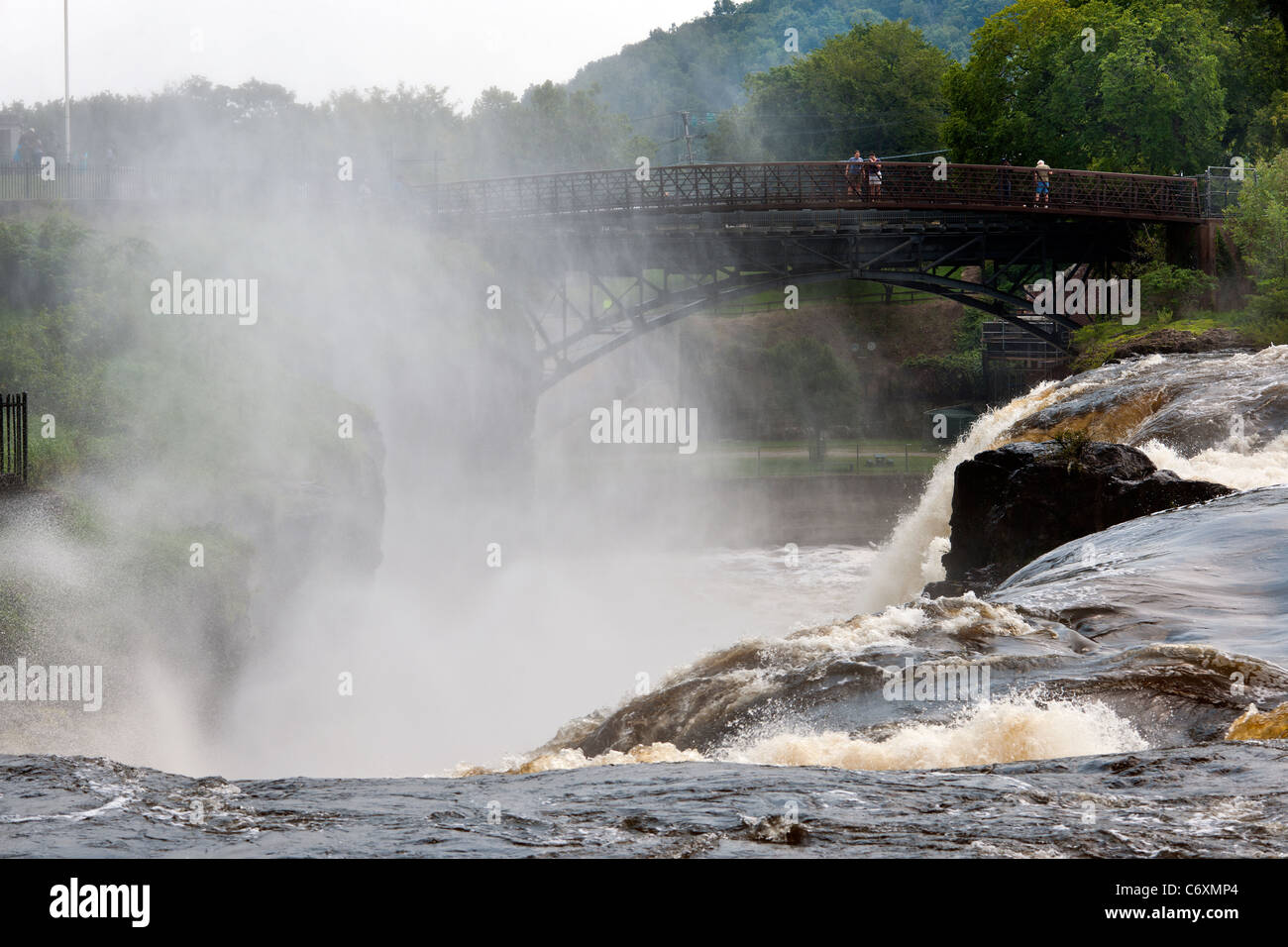 Thousands of gallons of water cascading over the Great Falls of the Passaic River in Paterson, NJ Stock Photo