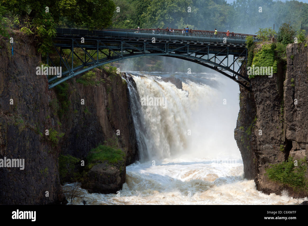 Thousands of gallons of water cascade over the Great Falls of the Passaic River in Paterson, NJ, Stock Photo