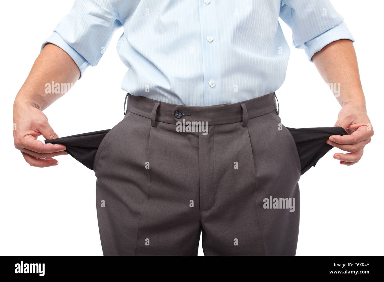 Businessman turning his empty pockets inside out, isolated on white