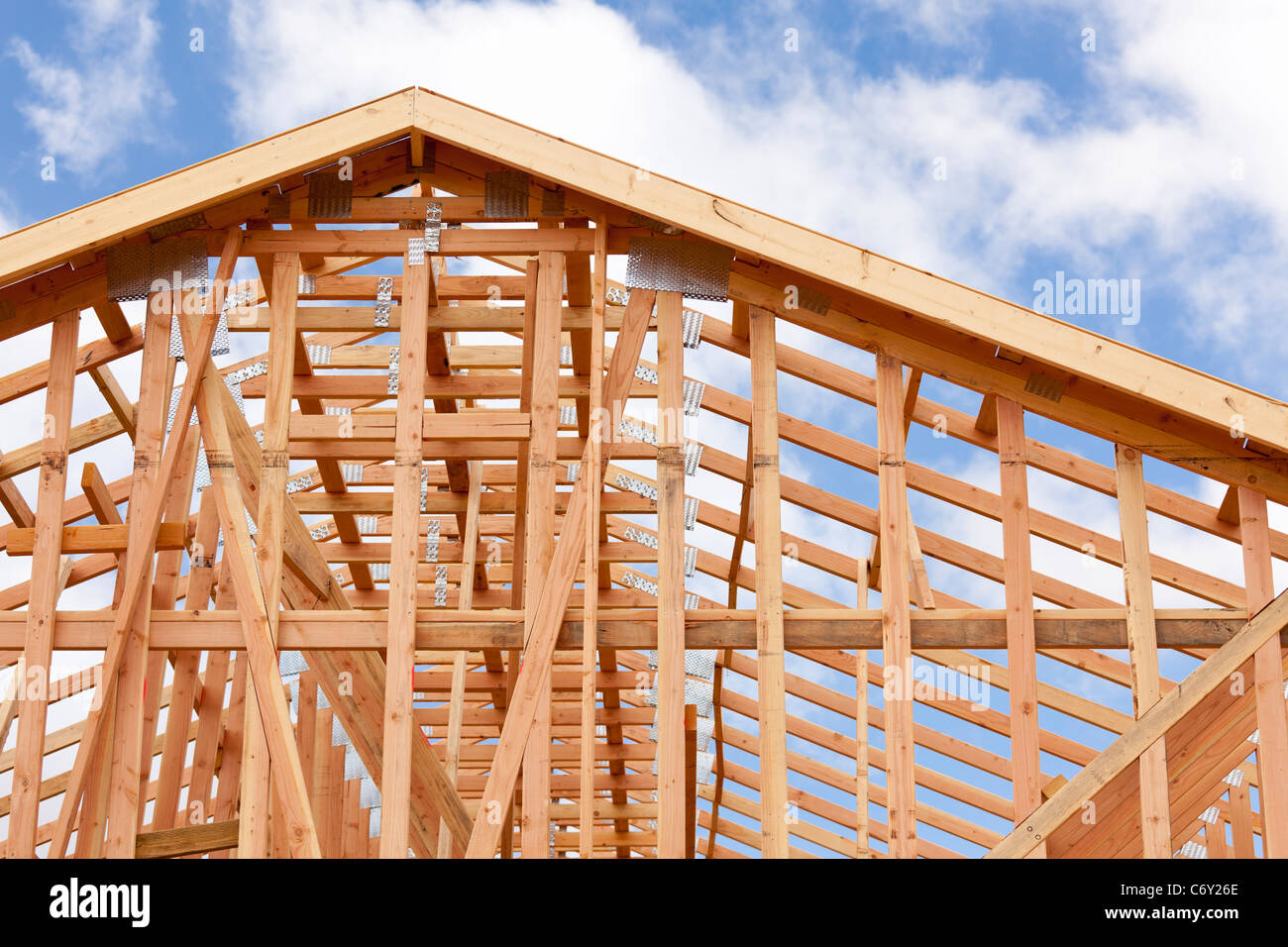 Wood Home Framing at Construction Site. Stock Photo