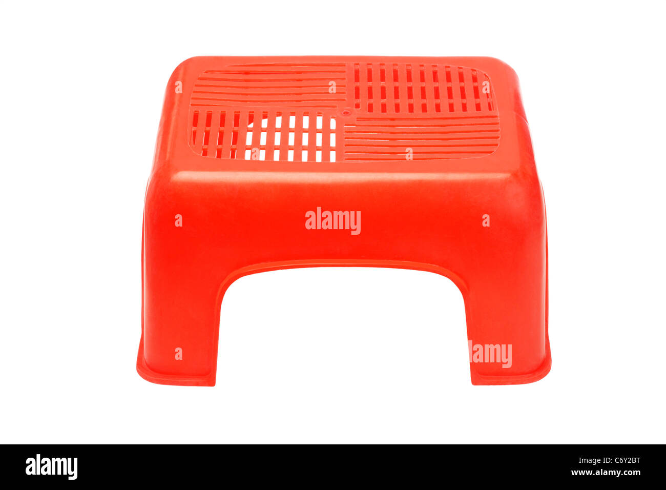 Mini red plastic stool on white background Stock Photo