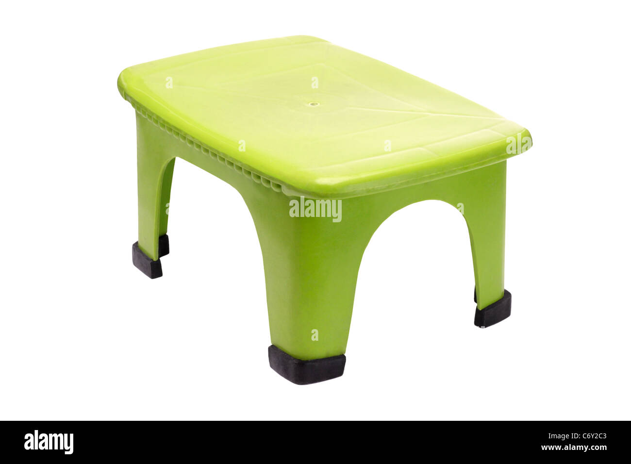 Small green plastic stool on white background Stock Photo