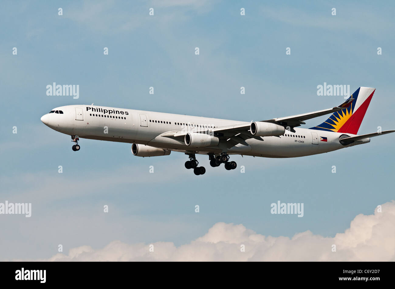 A Philippine Airlines Airbus A340 (A340-313X) jet airliner on final approach for landing at Vancouver International Airport. Stock Photo
