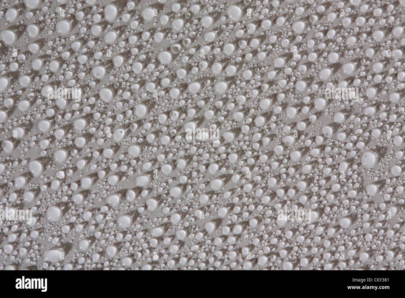 Water drop background on white surface Stock Photo - Alamy