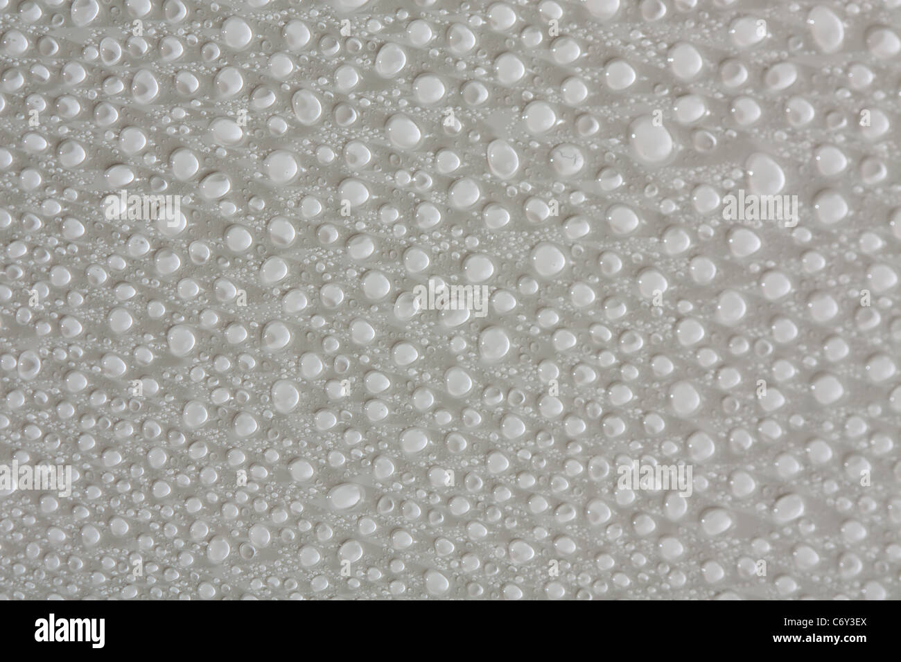 Water drop background on white surface Stock Photo - Alamy