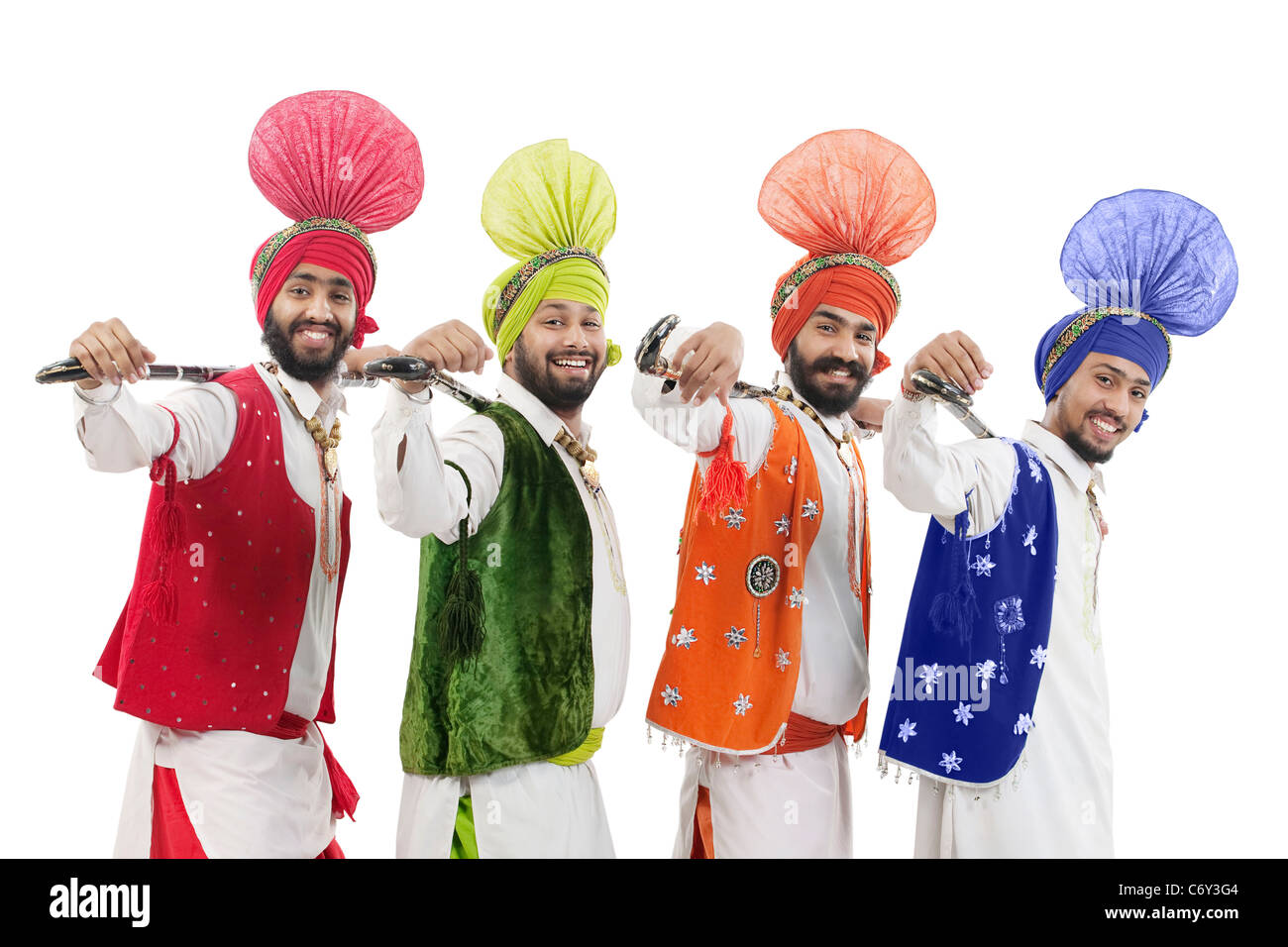 Sikh men posing with Khundis Stock Photo