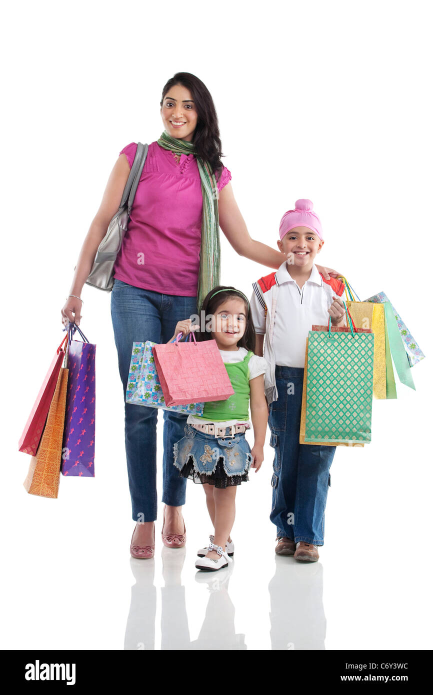 Family with shopping bags Stock Photo