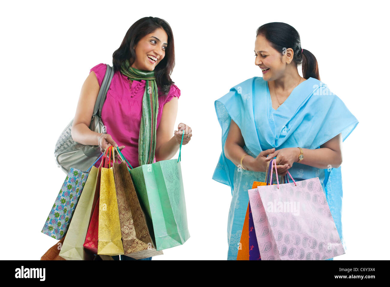 Mother and daughter with shopping bags Stock Photo