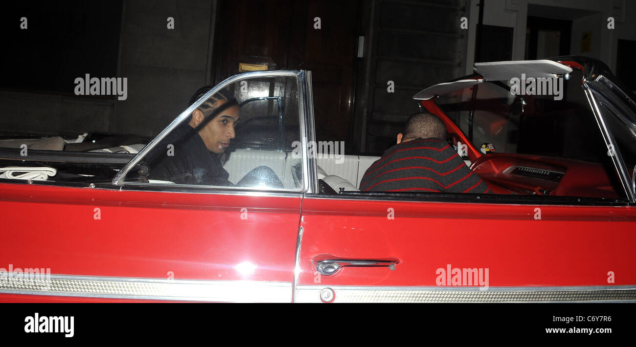 Benoit Assou-Ekotto and Adel Taarabt leave Funky Buddha club in a Chevrolet car London, England - 08.04.10 Stock Photo