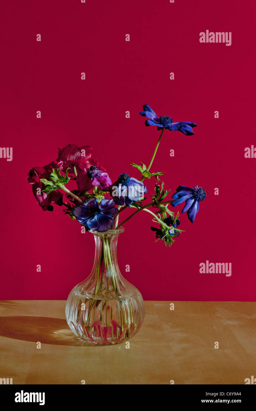 Vase of wilting flowers on table Stock Photo Alamy