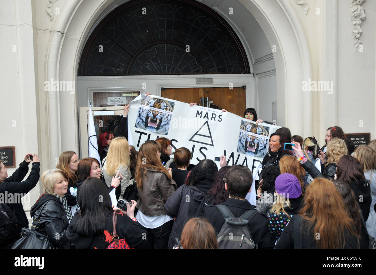 Atmosphere - Fans Jared Leto, Shannon Leto and Tomo Milicevic from the band '30 Seconds to Mars' arriving at the XFM radio Stock Photo