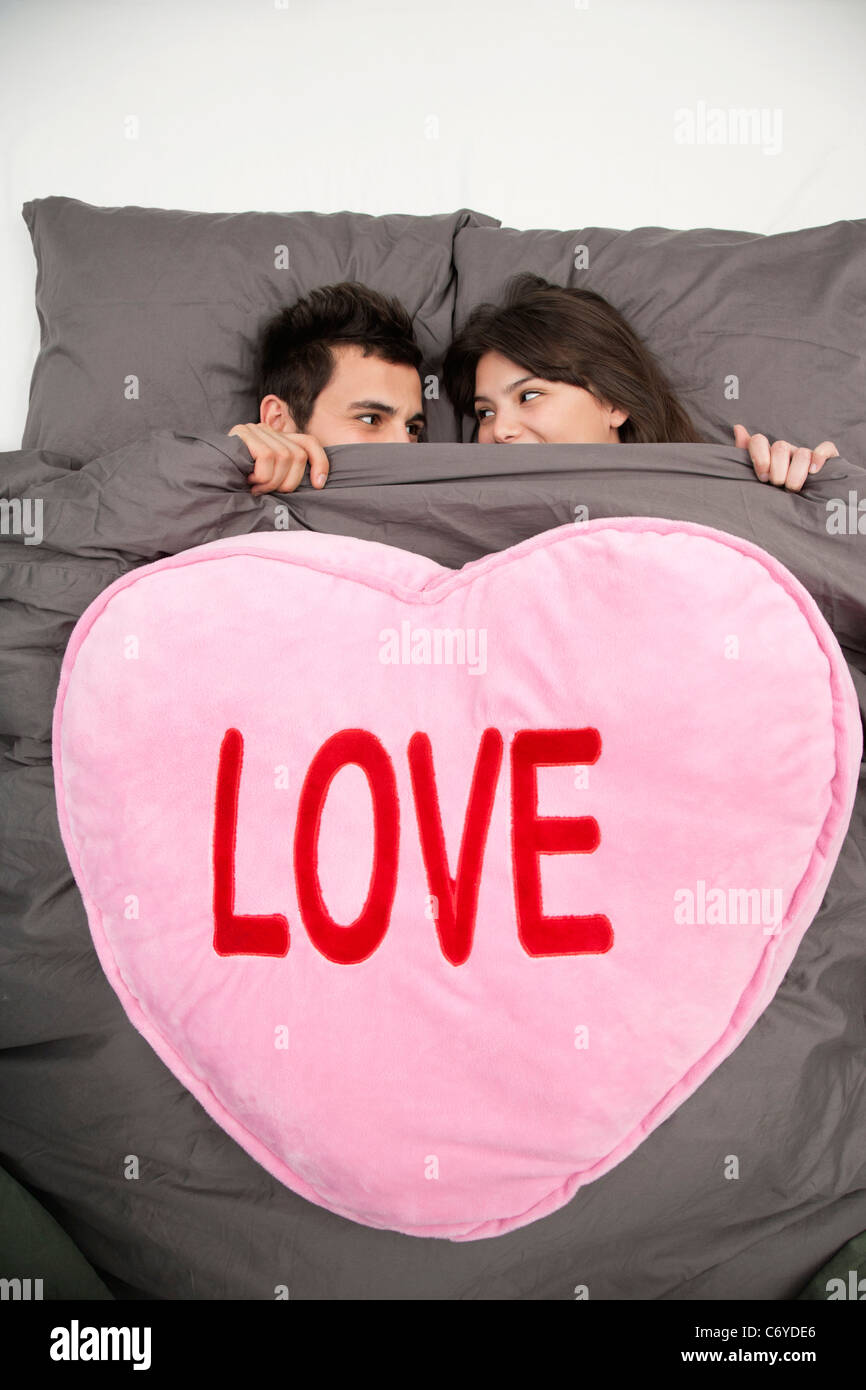 Couple Under Blanket Reading Love Stock Photo Alamy Couple Under Blanket Reading Love Stock Photo Alamy