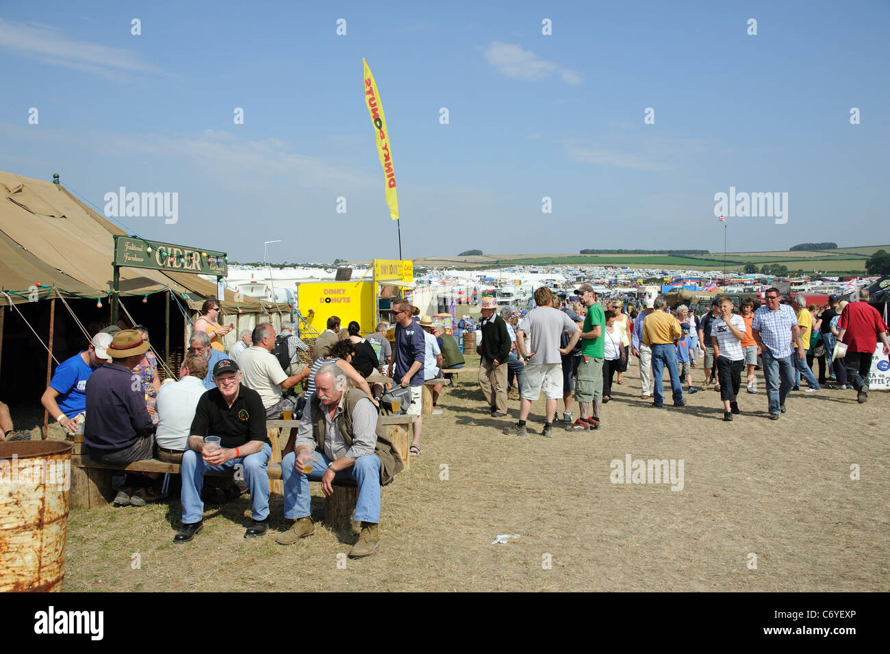 Visitors at the Great Dorset Steam fair at South Down Dorset England UK Set on 650 acres of farmland sit outside the beer tent Stock Photo